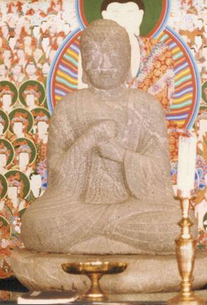 Seated stone Vairocana statue in Simboksa Temple
