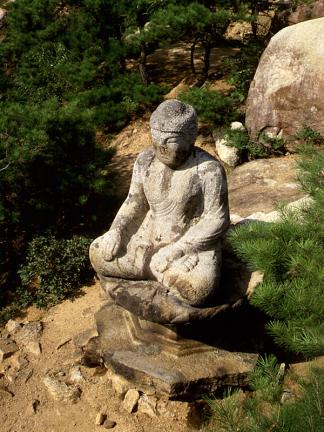 Seated stone buddha in Samneunggye Valley, Gyeongju