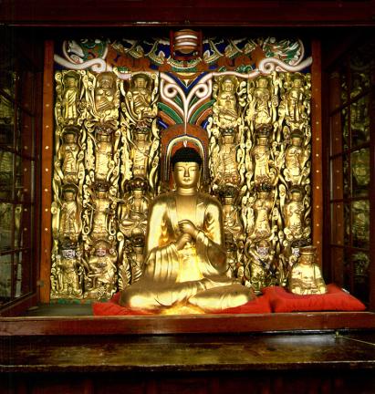 Wooden buddhist relief in Bogwangjeon Hall of Namjangsa Temple