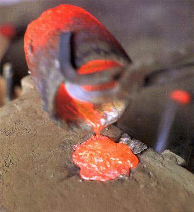 Pouring melted iron